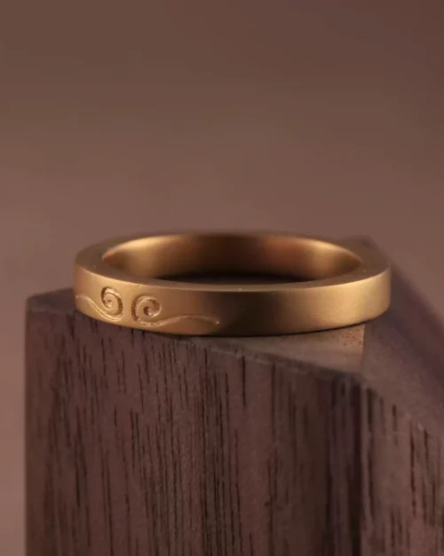 24k gold myth-inspired rings, hand-forged gold couple rings, symbolic gold wedding band
