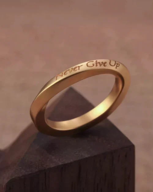 solid 24k mobius gold ring with engraved text, hand-forged wedding band pure gold