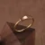 24k-gold-ring-AZK-7035-4 Откройте для себя массивное кольцо из 24-каратного золота, изготовленное вручную и украшенное гравировкой. Это значимый подарок на свадьбу, годовщину или важное событие в жизни.
