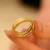 24k-gold-ring-AZK-7070-04 18K Gold Wedding Rings, Personalized Engraving with Red Accents, Custom Couple Rings