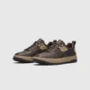 chunky sole leather casual sneakers in brown, front 45-degree view of the pair on a light gray background