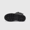 chunky sole leather ankle boots in black, outsole tread view on a light gray background