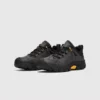leather outdoor hiking sneakers in black, front 45-degree view of the pair on a light gray background