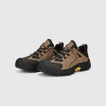 leather outdoor hiking sneakers in khaki, front 45-degree view of the pair on a light gray background