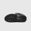 lightweight boa walking sneakers in black, outsole tread view on a light gray background