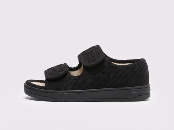 Side profile of black AZEKA adjustable strap linen sandals showing thick sole and hook-and-loop straps