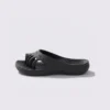 toe separator arch support slide sandals for women - open-toe cushioned platform in black, left side profile view on a light gray background