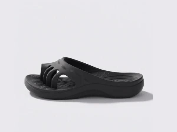 toe separator arch support slide sandals for women - open-toe cushioned platform in black, left side profile view on a light gray background