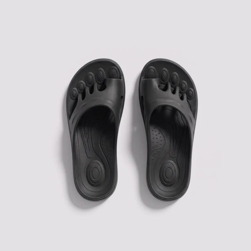 toe separator arch support slide sandals for women - open-toe cushioned platform in black, top-down view of the pair on a light gray background