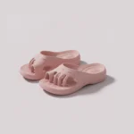 toe separator arch support slide sandals for women - open-toe cushioned platform in pink, front 45-degree view of the pair on a light gray background