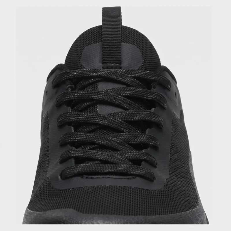 Closure detail of black trail running shoes showing lacing system