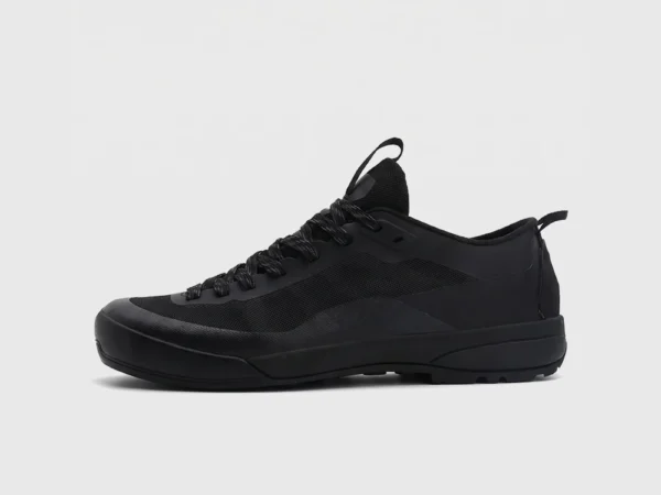 Men's low-top breathable trail running shoes in black, left side profile view