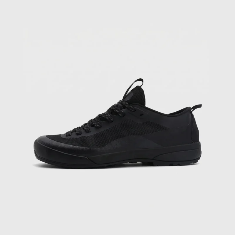 Men's low-top breathable trail running shoes in black, left side profile view