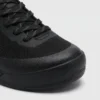 Toe detail of black trail running shoes showing mesh and overlays