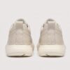 Beige menu2019s leather casual sneakers back view with heel pull tab