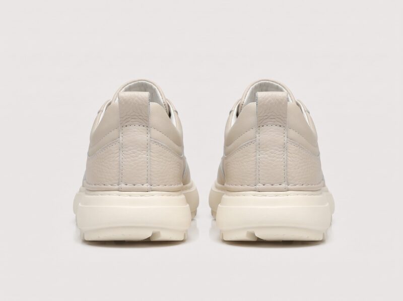 Beige menu2019s leather casual sneakers back view with heel pull tab
