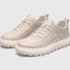 Menu2019s leather casual sneakers in beige, front 45 degree view