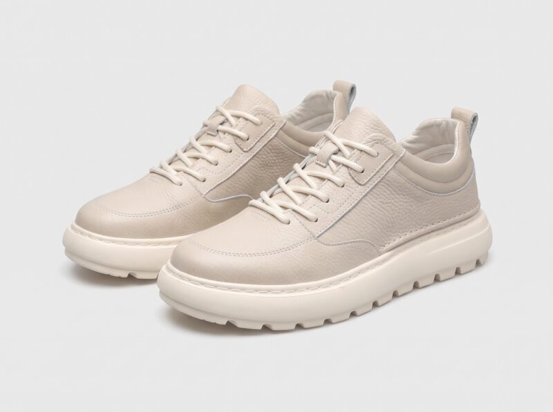 Menu2019s leather casual sneakers in beige, front 45 degree view