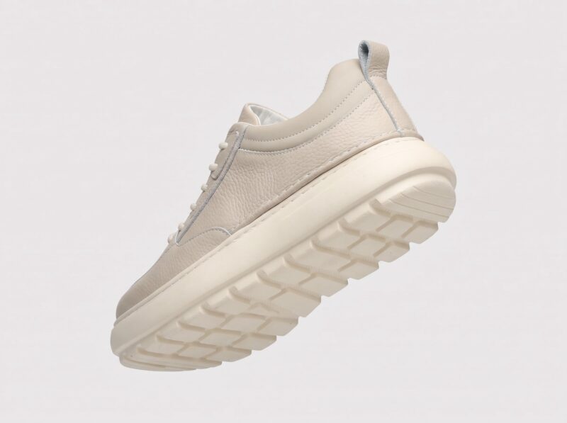 Heel and sole detail of menu2019s leather casual sneaker