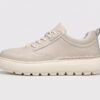 Menu2019s leather casual sneaker in beige, left side profile view
