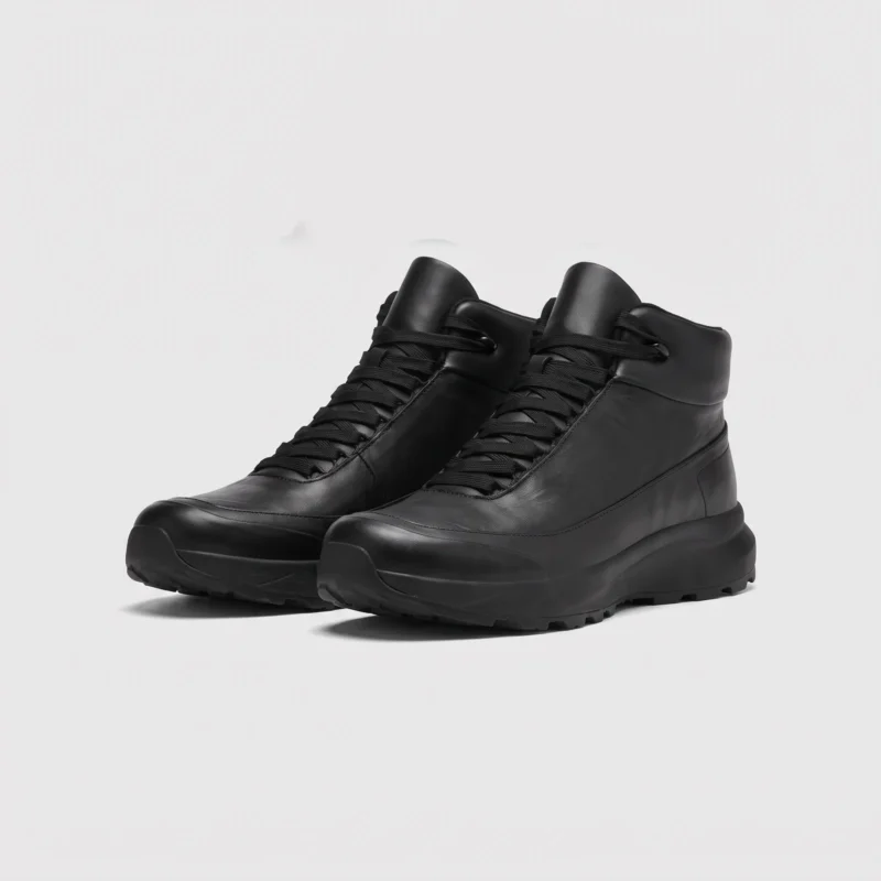 Black high-top leather boots, front 45 degree view