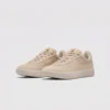 Retro German trainer sneakers in beige, front 45 degree view