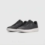 Retro German trainer sneakers in black, front 45 degree view