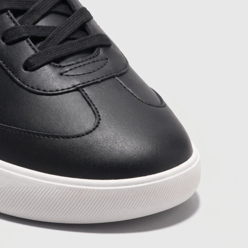 Toe detail of the retro German trainer sneakers showing the rounded toe cap