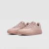 Retro German trainer sneakers in carbon pink, front 45 degree view