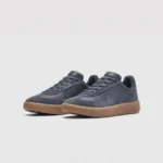 Retro German trainer sneakers in gray brown, front 45 degree view