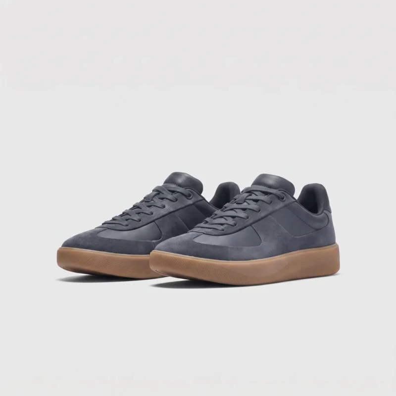 Retro German trainer sneakers in gray brown, front 45 degree view