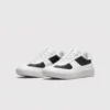 Retro German trainer sneakers in panda white and black, front 45 degree view