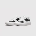 Retro German trainer sneakers in panda white and black, front 45 degree view