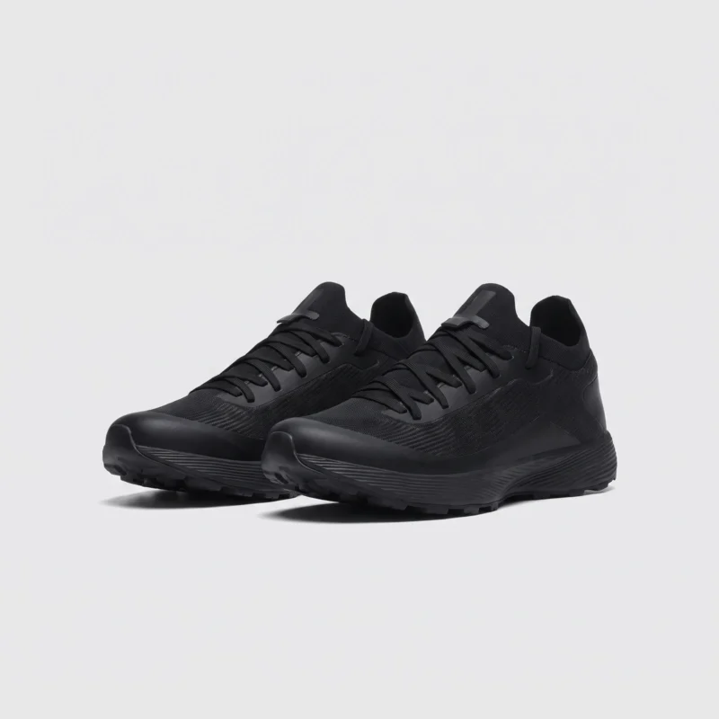 Lightweight trail running sneakers - black front 45 degree pair view