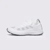 lightweight trail running sneakers in white, left side profile view on a light gray background