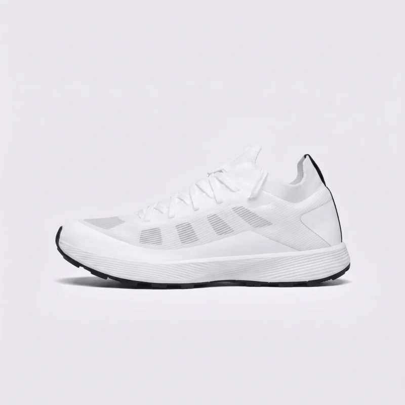 lightweight trail running sneakers in white, left side profile view on a light gray background