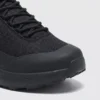 Toe detail of black waterproof trail running shoes showing protective toe cap