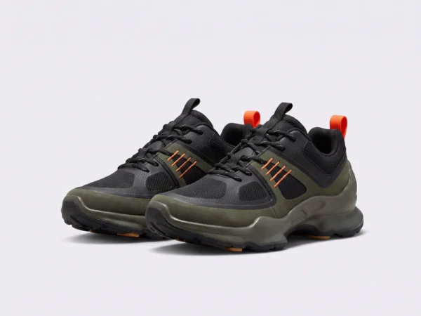 breathable mesh running sneakers lightweight chunky sole casual outdoor shoes in green, front 45-degree view of the pair on a light gray background