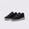 Black breathable wide fit walking shoes with hook-and-loop straps, front 45 degree view