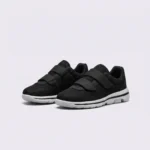 Black breathable wide fit walking shoes with hook-and-loop straps, front 45 degree view