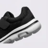 Close-up of the padded heel collar of black wide fit walking shoes