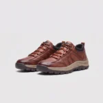 british style leather outdoor hiking shoes casual anti-slip sneakers in coffee, front 45-degree view of the pair on a light gray background
