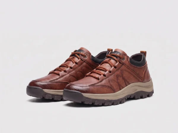 british style leather outdoor hiking shoes casual anti-slip sneakers in coffee, front 45-degree view of the pair on a light gray background