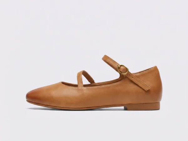 Side profile of apricot AZEKA Mary Jane flats showing low vamp and slender strap line