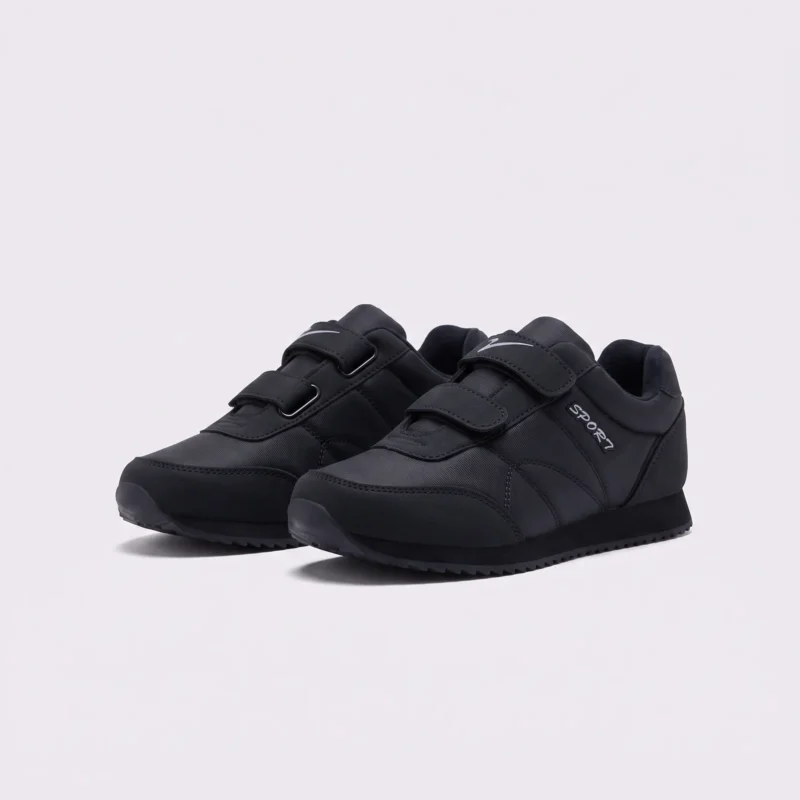 cushioned walking sneakers hook-and-loop slip-on non-slip comfort shoes in black, front 45-degree view of the pair on a light gray background