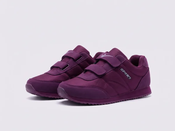 cushioned walking sneakers hook-and-loop slip-on non-slip comfort shoes, front 45-degree view of the pair on a light gray background
