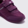 cushioned walking sneakers hook-and-loop slip-on non-slip comfort shoes, close-up view of the toe on a light gray background