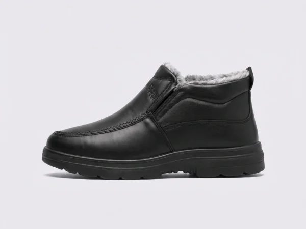 Side profile of a black AZEKA fleece-lined slip-on winter shoe showing elastic gore panel and plush collar lining