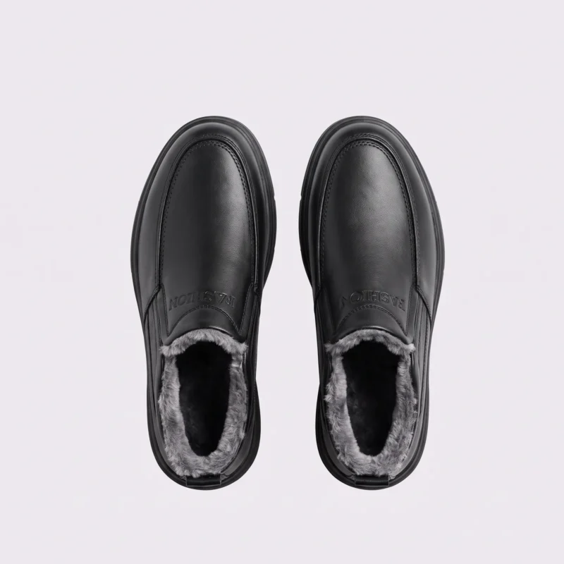 Top-down view of a pair of black AZEKA fleece-lined slip-on winter shoes showing rounded toe and soft gray fleece lining