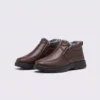 Pair of coffee brown AZEKA fleece-lined slip-on winter shoes with gray plush collar and thick cushioned sole, front 45 degree view on light gray background